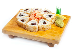 rice sushi on wooden tray